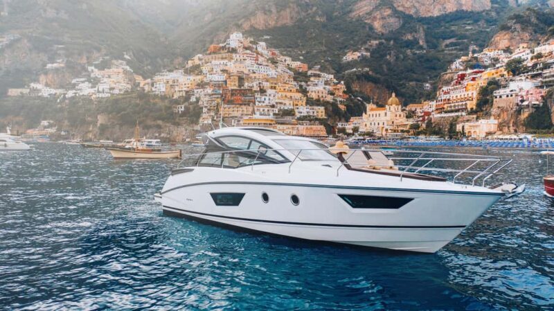 Positano Magic Experience: Secret Bays, African Caves, Champagne Cruise - Transport, Group Size, and Pricing