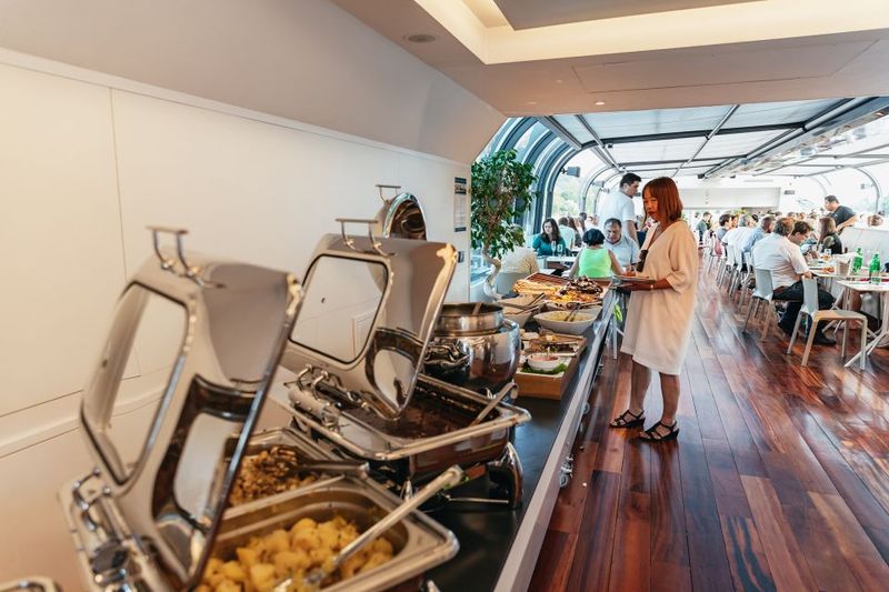 Prague: Sightseeing Dinner Cruise on Open-Top Glass Boat - Buffet Dinner With Czech and International Options