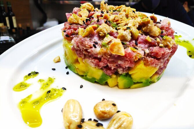 PREMIUM TAPAS TOUR: Paella, Market Tastings, and Winery - The Guide and Group Size