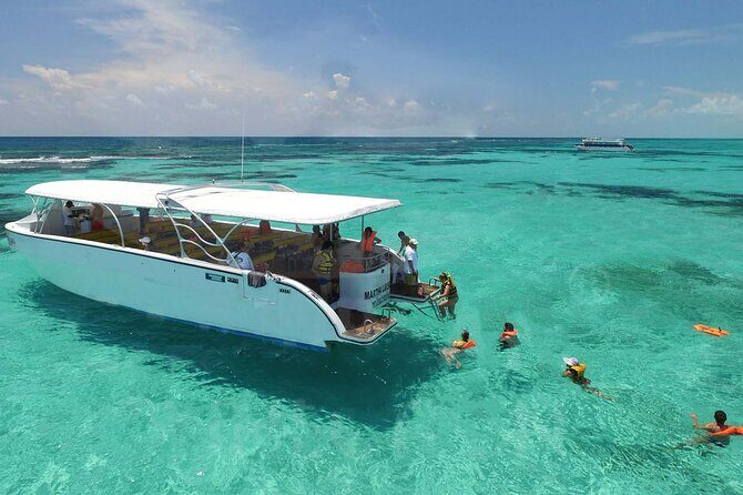 Private Boat to Isla Mujeres with Open Bar from Playa del Carmen - The Experience for Different Travelers