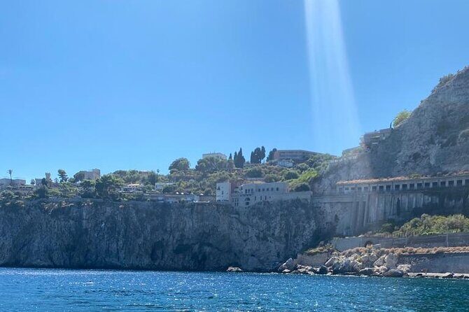 Private boat tour Giardini Naxos Taormina with platter and wine - The Tour Experience in Detail