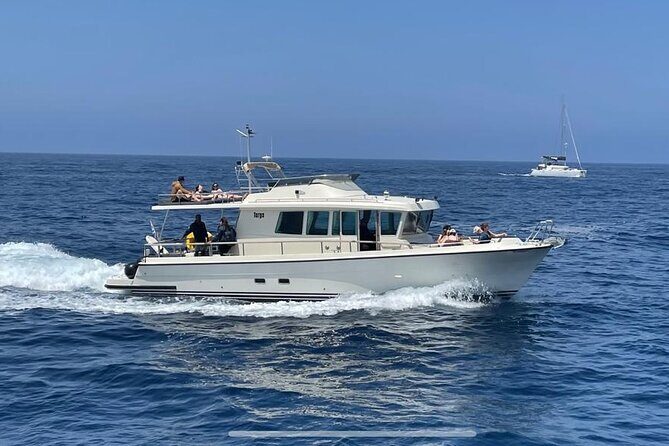 Private Full-Day Motor Yacht Cruise with Meal, Open Bar+Transfers - Key Points