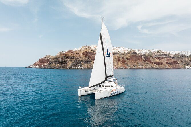 Private Morning Tour Lagoon 400-380 Sailing in Santorini ,lunch, drink, transfer - Key Points