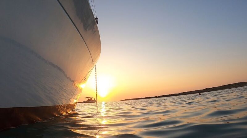 Private Sunset Cruise to Antiparos with Local Snacks - Return and Relaxation