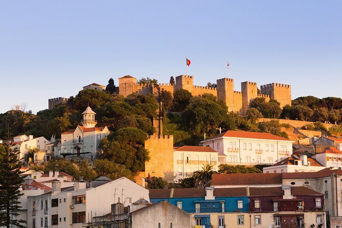 Private Tour: Lisbon Sunset Walking Tour with Fado Show and Dinner - The Fado Dinner and Show Experience