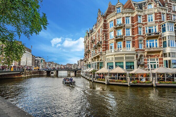 Private transfer from Bruges to Amsterdam, 2h Stop in Utrecht - Key Points