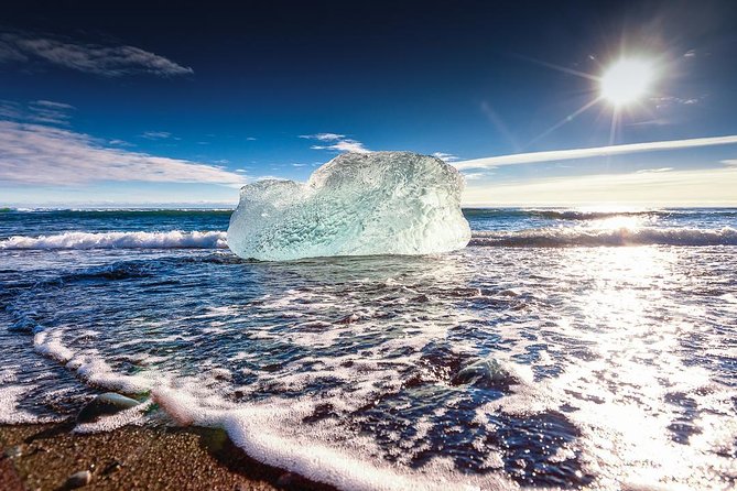 Reykjavik: Glacier Lagoon Boat Ride & South Coast Full Day Tour - The included boat ride among icebergs: up close, but mind the weather