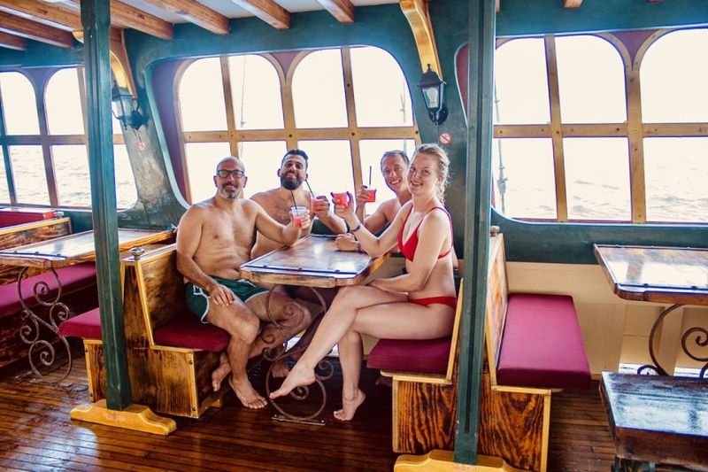 Rhodes: All Inclusive Day Cruise with BBQ & Unlimited Drinks - Three Swim Stops: Kallithea Springs, Traganou Caves, and Anthony Quinn Bay