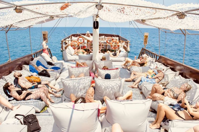 Rhodes: All Inclusive Day Cruise with BBQ & Unlimited Drinks - Top Deck Bean Bags vs Lower Deck Tables: Choose Your Comfort