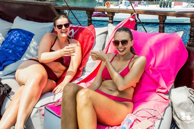 Rhodes: Sunset Cruise with Greek BBQ and Unlimited Drinks - Top deck vs bottom deck: choose based on comfort