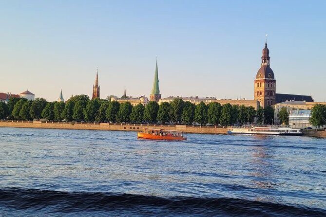 Riga Canal and Daugava Boat Tour with Welcome Drink & Audio Guide - A Closer Look at the Itinerary and Experience