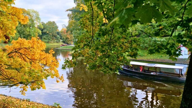 Riga: Canal Boat Tour with Drink & Old Town Audio Tour - The Welcome Drink and Atmosphere