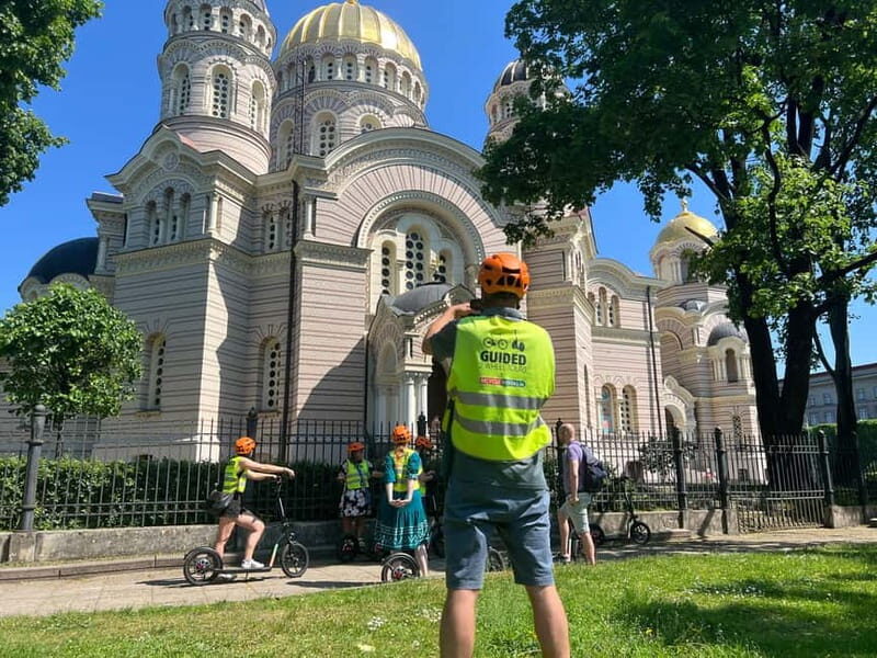 Riga Highlight Big wheel e-scooter Group or Private tour - The Sum Up