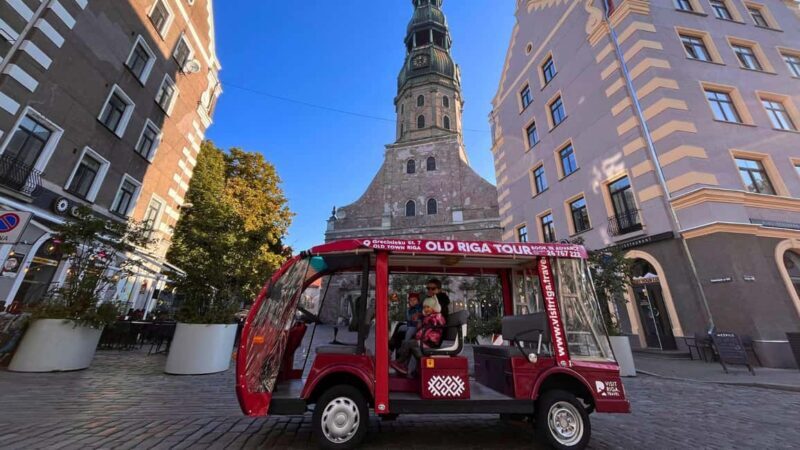 Riga: Old Town E-Bus Tour with Audio Guide & Welcome Drink - Key Points