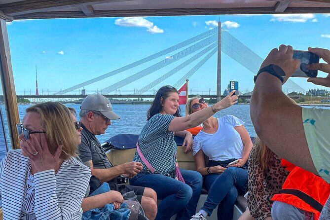 Riga Sightseeing Tour by Canal Boat with Audioguide - Authentic Experiences from Reviews