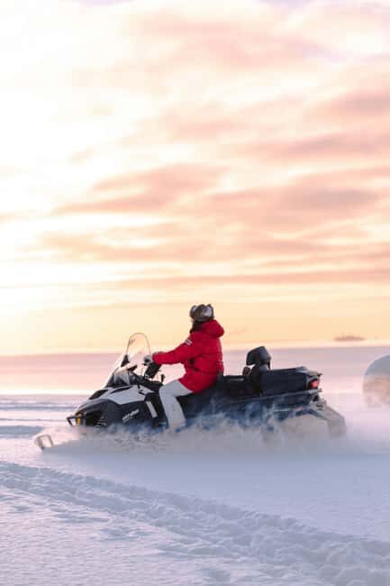 Riga: Snowmobile Adventure with Transfer - Key Points