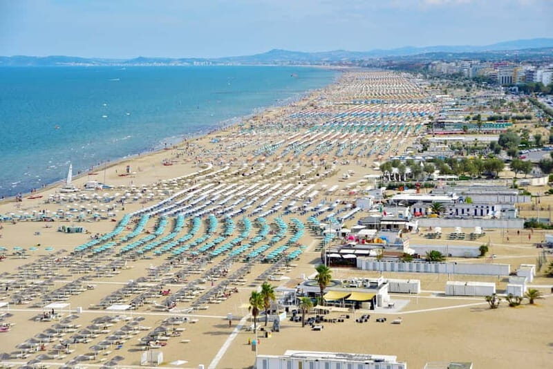 Rimini: Beach Umbrella and Sun Bed at 67 Beach with Drink - Key Points