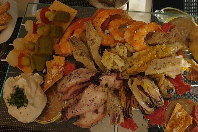 Romantic Deluxe Lunch or Dinner in Oia with VIP Private Transportation - The Experience in Detail: A Full Breakdown