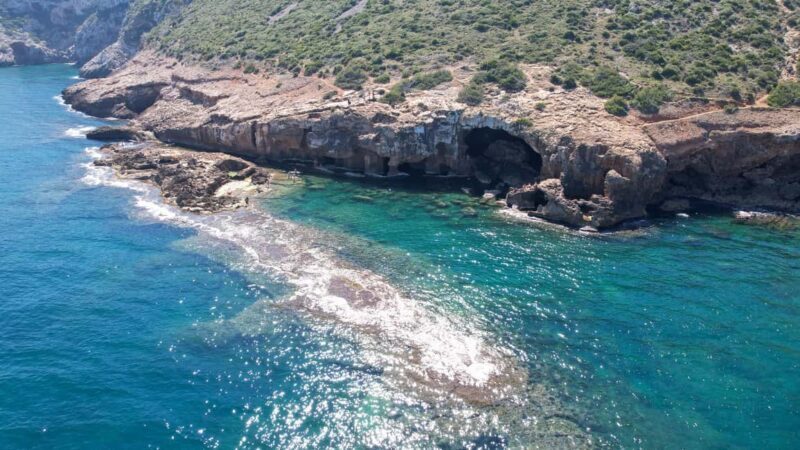 Sailing catamaran ride through Cova Tallada and optional swim stop - Key Points