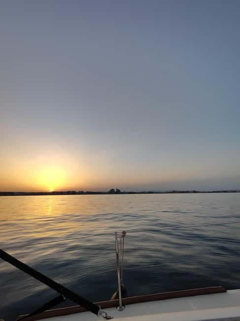 Sailing with sunset and swim in the sea - Key Points