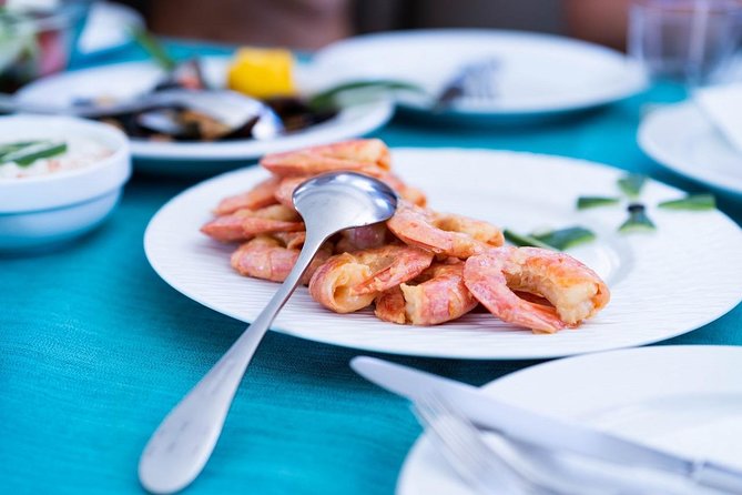 Santorini All-inclusive Catamaran Cruise with Thirassia Stop - Volcano route: passing islands, then the warm springs swim