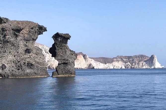 Santorini Catamaran Cruise with Greek Meal, Open-Bar and Sunset - Small Group Size and the Social Element