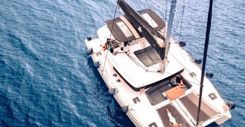 Santorini: Catamaran Cruise with Lunch, Drinks, & Oia Visit - Key Points