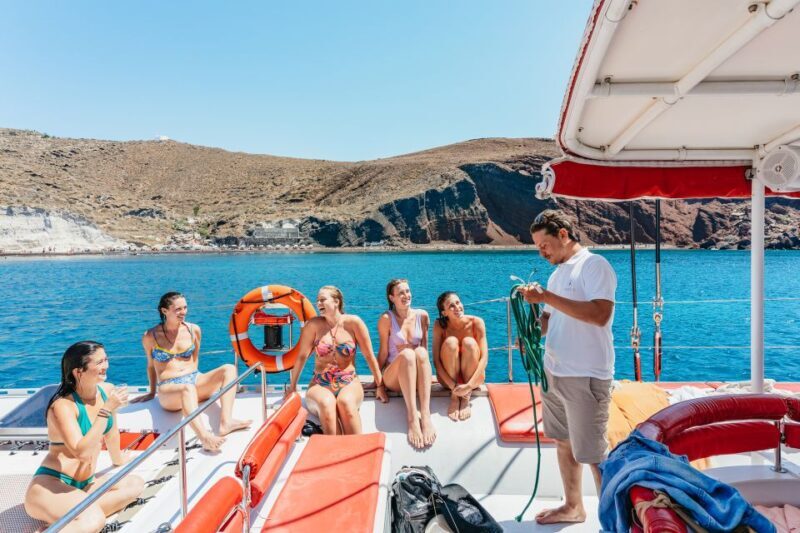 Santorini: Catamaran Tour with BBQ Dinner, Drinks, and Music - The Real Traveler Experience