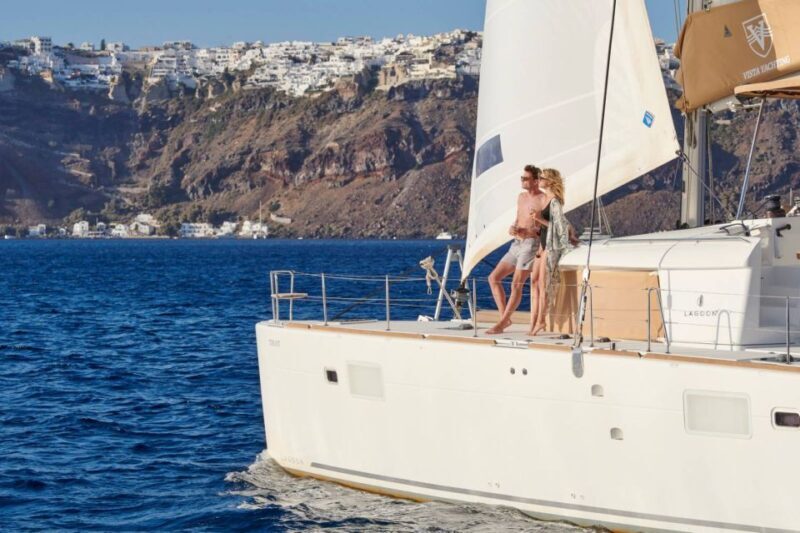 Santorini Gold Catamaran Cruise with Snorkel, BBQ & Open Bar - Key Points