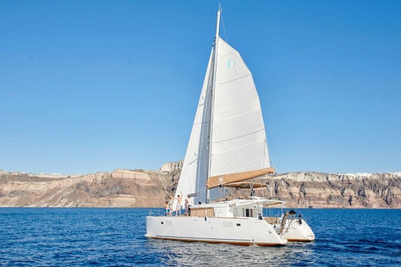 Santorini Gold Catamaran Cruise with Snorkel, BBQ & Open Bar - Stop 3: Volcano hot springs—warm, sulfur-rich, and very different