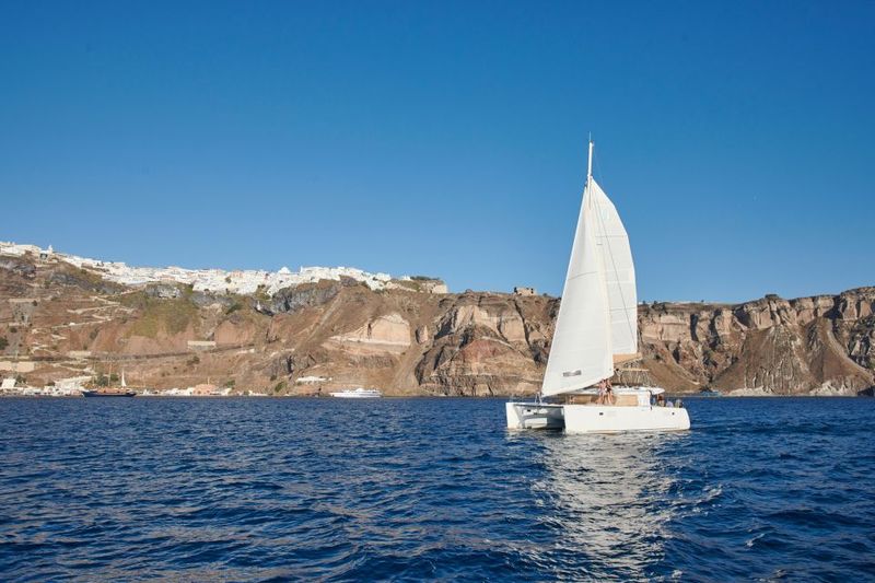 Santorini Gold Catamaran Cruise with Snorkel, BBQ & Open Bar - Stop 4: Mesa Pigadia Beach for snorkel + BBQ lunch onboard