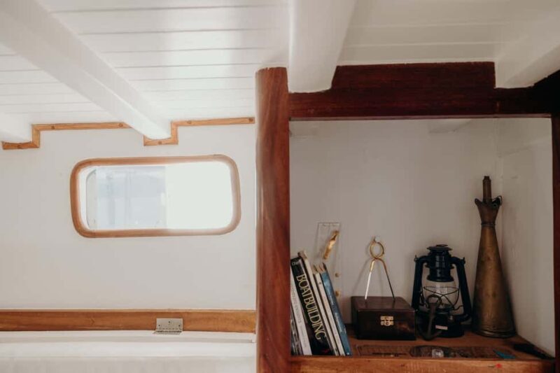 Santorini: Ios Island Overnight Sailing Trip with Meals - Key Points