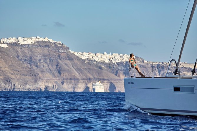 Santorini Luxury Sailing Catamaran Cruise with BBQ, Drinks and Transfer - Ancient Lighthouse Views From the Sea: Best “See It” Without Crowds