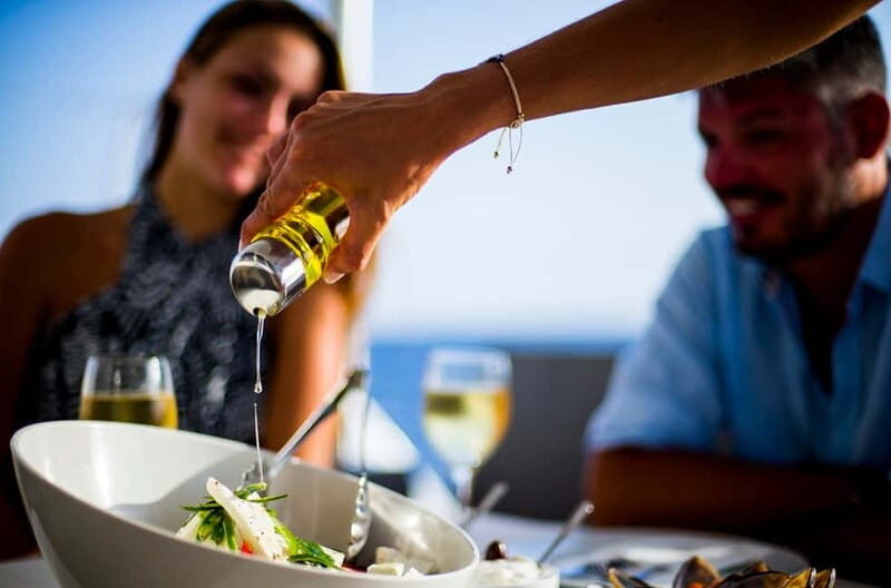 Santorini: Private Catamaran Cruise with BBQ Meal and Drinks - Key Points