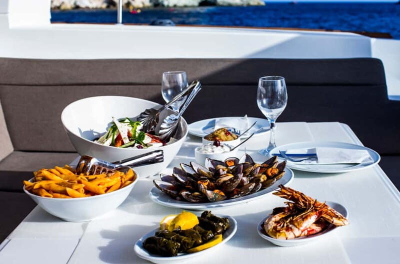Santorini: Private Catamaran Cruise with BBQ Meal and Drinks - Relaxation and Privacy: Sunbathing and Taking in the Views