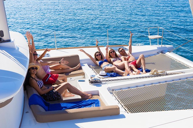 Santorini Private Catamaran Cruise with BBQ, Open Bar & Transfers - Thirasia Island and Optional Extended Exploration