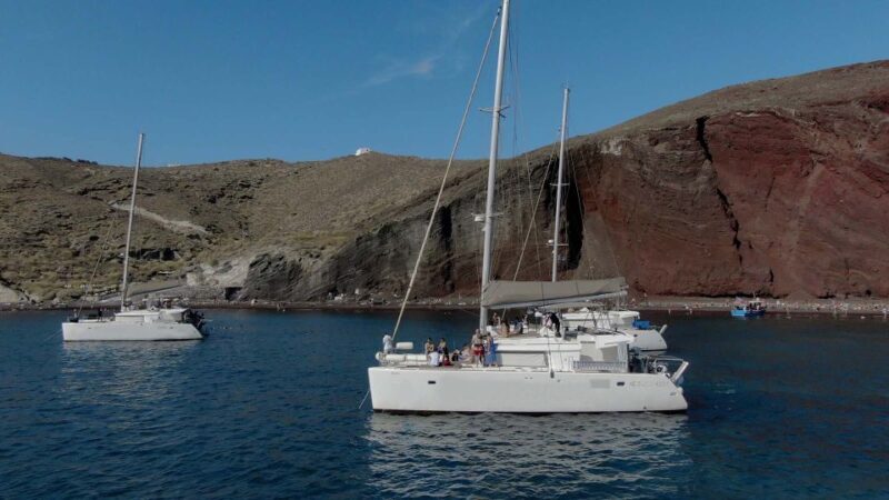 Santorini: Sunset Cruise with Greek Dinner and Transfer - The Experience in Detail