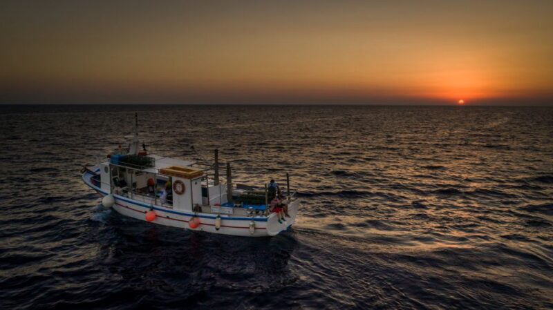 Santorini Sunset Fishing Trip with Dinner and Drinks - Discover the Santorini Sunset Fishing Trip with Dinner and Drinks