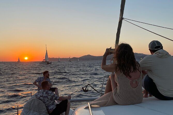 Santorini Sunset Sailing Cruise: Dinner, BBQ, Open Bar, Transfers - An In-Depth Look at the Santorini Sunset Sailing Cruise