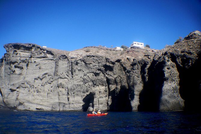 Santorini: Sunset Sea Kayak with Light Dinner - What Travelers Love Most