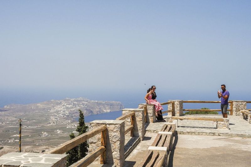 Santorini: Top Sights Day Trip, Wine Tasting, & Oia Sunset - Oia at sunset: blue domes, castle area bustle, and photo time