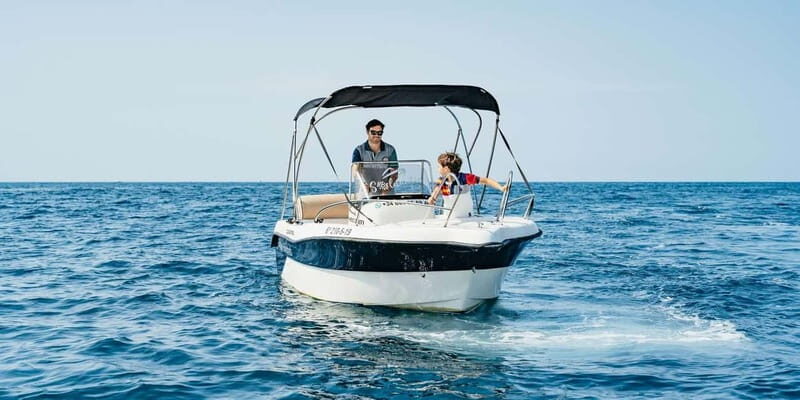Scenic Boat Ride and Coastal Adventure in Sitges + Transport - The thrill of driving your own boat