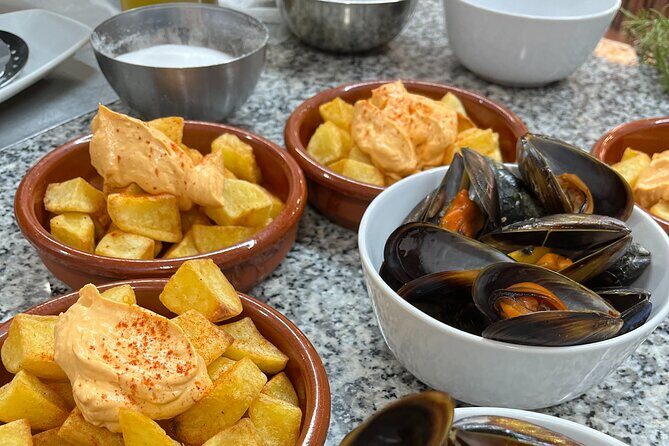 Seafood paella cooking class, tapas and visit to Ruzafa market. - Price and Value