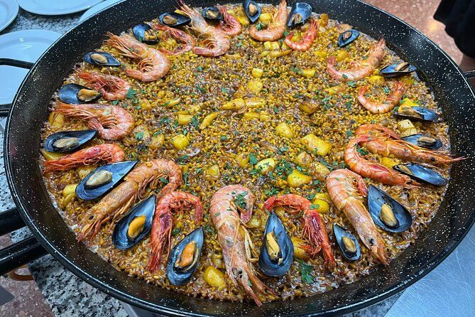 Seafood paella cooking class, tapas and visit to Ruzafa market. - The Seafood Paella Cooking: Hands-On, Not Lectures