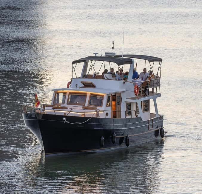 Seville: Flamenco Yacht Cruise with Tapas and Drinks - Key Points