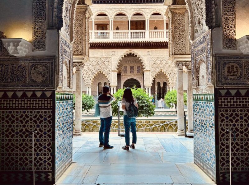 Seville Full Day Tour with Alcázar & Flamenco - Exploring Triana: Culture by the River