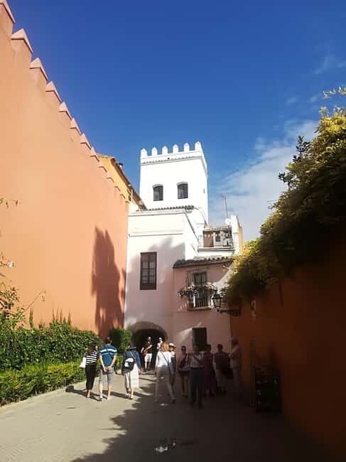 Seville: Tiny-Group Medieval Quarter Discovery Walking Tour - Key Points