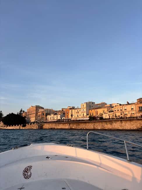Siracusa: Christmas Boat Tour with "Spumante and Pandoro" - The Sea and Coastal Landmarks