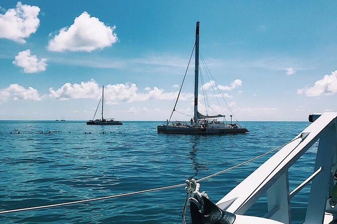 Snorkel adventure to Isla Mujeres by Catamaran. Open Bar and buffet included. - Return Journey and Final Views