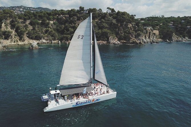 Special tour for groups sailing along the Costa Brava in a big catamaran. Food and drinks included. - What to Expect on the Costa Brava Catamaran Tour